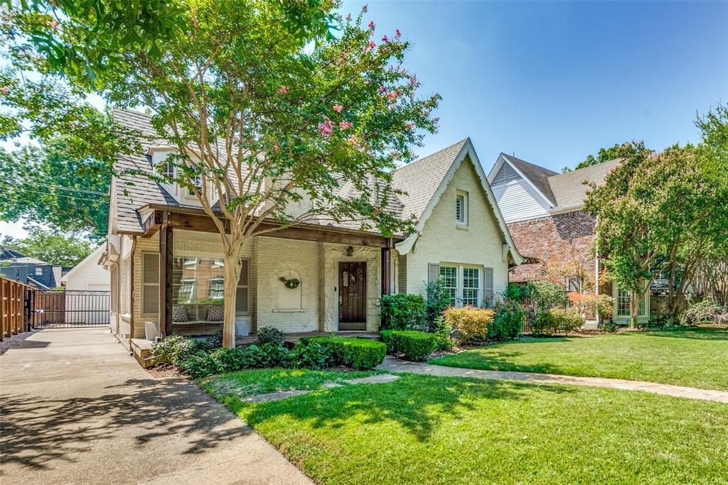 This charming University Park English Tudor cottage with a 60-foot frontage offers a noticeable presence on the street especially with its NEW roof! The design elements, such as arched doorways, tall ceilings, and large windows, contribute to an inviting and spacious atmosphere. An updated kitchen, light cabinets and stainless steel appliances creates a modern and functional culinary space for everyone to enjoy. The large primary suite is located on the main level while 3 bedrooms and a flex space are upstairs. A large turfed backyard is a great space for outdoor activities and relaxation. The generously sized side yard with a deck and covered pergola provides an inviting area for al fresco entertaining. Two blocks from University Park Elementary, Curtis Park and Snider Plaza.