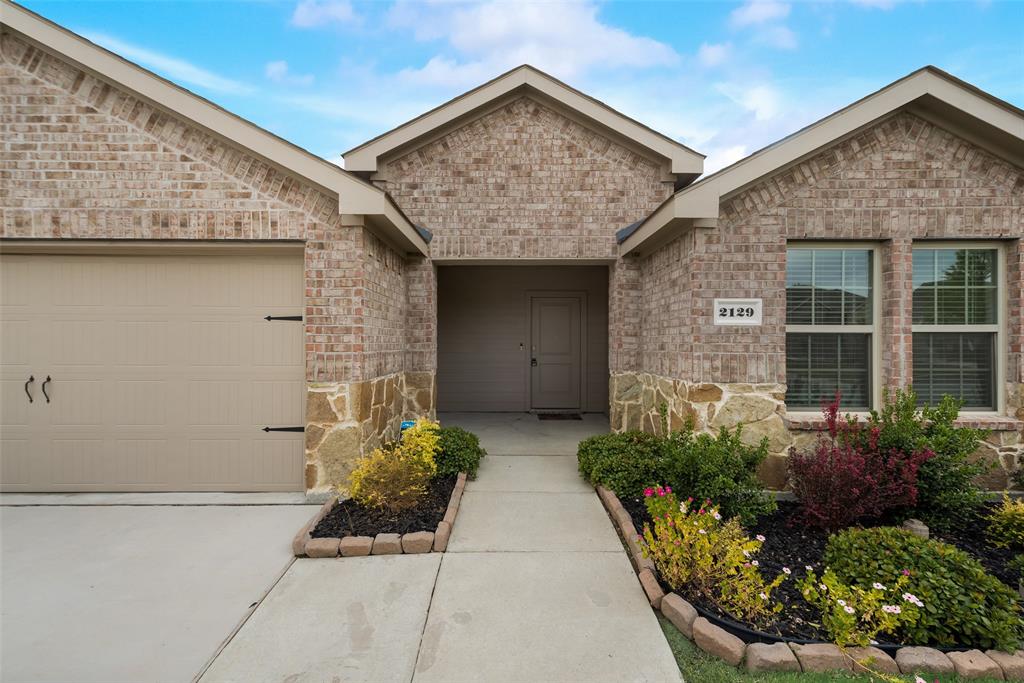 Cute and Affordable family home located near coveted Ruth Cherry Elementary. Beautiful flowers and trees present a lovely ambience when approaching the front door. Parents will love that the Primary bedroom is on the opposite side of the home from the other bedrooms; bright and cozy bedrooms each with windows and carpet. The living and kitchen areas feature many windows allowing for a plenty of natural light and views of the children playing in the grassy backyard. The Primary bathroom includes a massive walk-in closet that is as big as room! Recessed lighting has been added to the garage for those who like to use it as additional living space. This smart house includes programmable garage door, porch light and A.C. The recessed lighting in the living room can be controlled through an app to turn off and on and even change colors! The kitchen sink has been upgraded to composite granite and the backyard storm door contains a dog door! SELLERS ARE EXTREMELY MOTIVATED!!