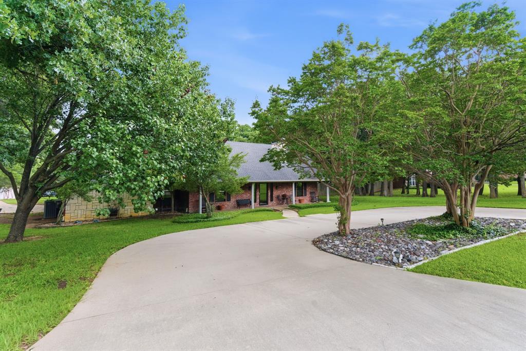 Nestled on 1.3 acres in Alvarado, this spacious 3 bedroom, 2 bath home with a 3-car garage and a 730 sq. ft. mother-in-law suite offers endless potential with plenty of room to grow and make it your own! The private suite includes its own bedroom, full bath, kitchen, dining area, and living room, ideal for multigenerational living, guests, or rental opportunities. Inside the main home, you’ll find beautiful wood flooring, an updated kitchen with stainless steel appliances, and a functional layout designed for comfortable living and entertaining. Step outside and enjoy your private backyard retreat featuring a pool and outdoor kitchen with a gas grill — perfect for relaxing or hosting gatherings. Additional features include an attic lift, septic system, and plenty of space to expand. Seller is offering concessions for carpet and paint, giving buyers the opportunity to add their own personal touches and updates. Enjoy the peace of country living while still being conveniently located near town amenities!