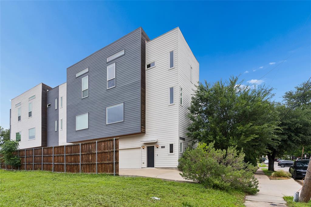 Welcome to this beautifully designed 2-bedroom, 2.5-bath CORNER-UNIT home in the heart of Dallas, offering modern finishes, abundant natural light, and a highly functional layout. This thoughtfully crafted residence combines style and convenience, making it ideal for both everyday living and entertaining.

The first floor features a practical laundry and mud room, providing added storage and organization right as you enter the home.

On the second level, the main living area truly shines with soaring 12-foot ceilings and an abundance of windows, including a large picture window and additional corner windows that fill the space with natural light. The open-concept kitchen is outfitted with sleek quartz countertops and flows seamlessly into the defined living and dining areas, creating the perfect setting for gatherings. A dedicated dry bar complete with a wine fridge adds a sophisticated touch for hosting and entertaining.

The upper levels offer well-sized bedrooms and thoughtfully designed spaces that provide comfort and privacy.

As a corner unit, this home enjoys enhanced natural light and a more open feel compared to interior units.

Conveniently located near shopping, dining, and major highways, this home provides easy access to everything Dallas has to offer while maintaining a comfortable residential setting.

Don’t miss the opportunity to own this stylish and well-appointed home in a prime location.