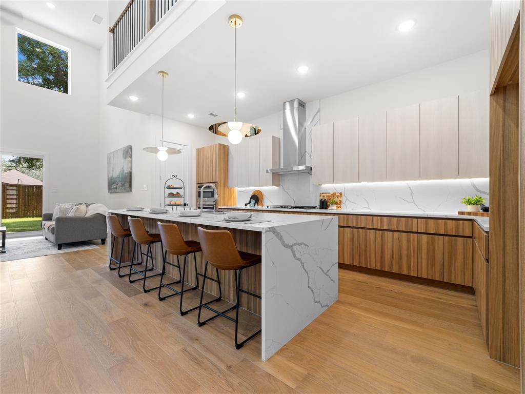 416 Mount Auburn Avenue · Dallas, TX 75223
5 Bed · 4.5 Bath · 4,200 Sq Ft · New Construction · $798,900
Nearly 4,200 square feet of new construction in one of East Dallas's most sought-after pockets, and this one is built differently.
The first-floor primary suite sets the tone: generous proportions, dual walk-in closets, and a spa-style bath that makes coming home feel like a reset. No stairs at the end of a long day. Upstairs, a dedicated home office, media room, and game room give every member of the household their own space, five bedrooms, four and a half baths, and a floor plan that works as hard as the people living in it.
The kitchen earns its place: flat-panel frameless cabinetry, Calacatta white quartz waterfall island, full-height backsplash, undercabinet lighting, GE stainless appliances, and a vented designer hood. European oak engineered hardwood, vertical black cable railing, 6' baseboards, and 5-panel shaker doors carry that same elevated standard through every room.
Built to last and perform: 5-ton 2-zone HVAC 16 SEER 95% AFUE, spray foam insulation, NFRC-certified windows with STC noise reduction, tankless water heater, Energy Code Green Certified, and built-in Taexx pest control. EV-ready oversized garage. Pool-ready backyard with 8' cedar privacy fence and full sprinkler system.
Step outside and you're on the Santa Fe Trail with direct access to White Rock Lake. Tenison Park Golf, Samuell Grand Park, Lower Greenville, the Granada Theater, Deep Ellum, and the Baylor Medical District are all minutes away. DART rail access close by. Zoned to Mount Auburn Elementary, J.L. Long Middle, and Woodrow Wilson High; with Lakehill Prep, St. John's Episcopal, Hockaday, and Lakewood Montessori nearby.
Highlights sheet, floor plan, and video tour attached. Schedule your private showing today.