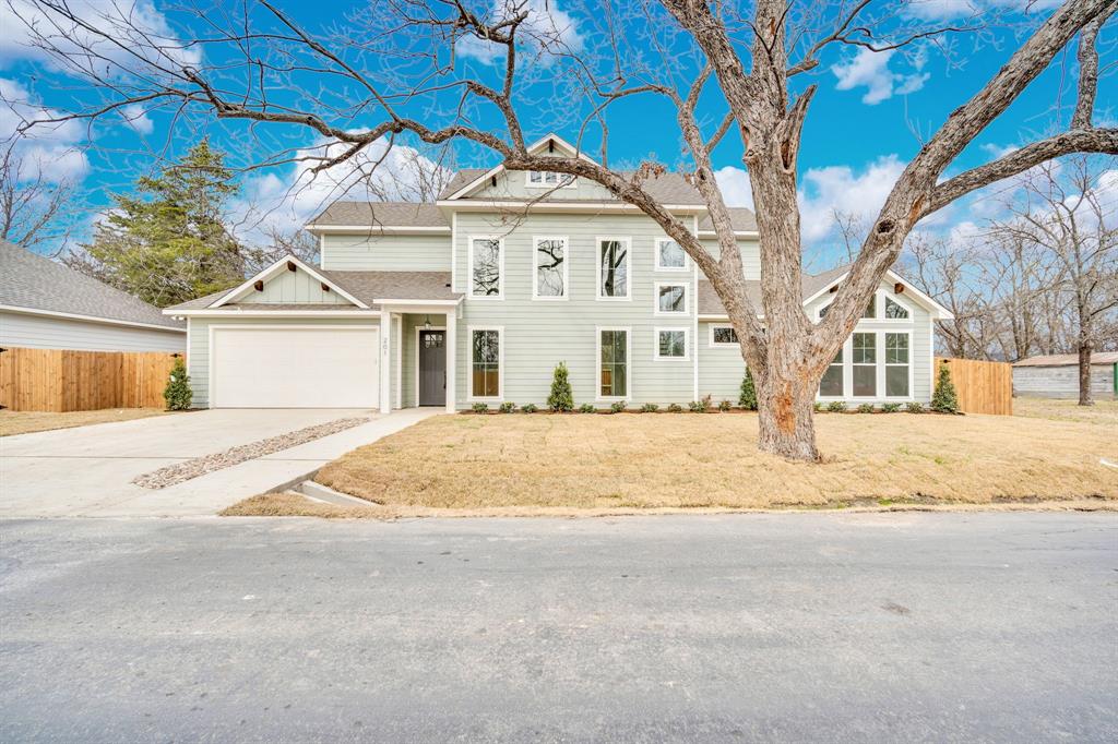 STUNNING NEW CONSTRUCTION JUST MINUTES FROM DOWNTOWN! - MOTIVATED SELLER

Designed to impress, this 3-bedroom, 3-bath home with a 2-car garage features a two-story living area with a wall of windows and an open-concept layout that maximizes light and space. Elevated ceiling height adds openness while maintaining everyday functionality.

The kitchen makes a statement with quartz countertops, ceiling-height custom cabinetry, stainless steel appliances, subway tile backsplash, and a large island with seating. A walk-in butler’s pantry adds both function and extra storage.

The primary suite includes an en-suite bath with dual vanities, a garden tub integrated within the oversized walk-in shower, and a spacious walk-in closet. Upstairs, a loft overlooks the main living area below, along with two well-sized secondary bedrooms and a full bathroom.

Additional highlights include a dedicated laundry room with built-in cabinetry, wide-plank flooring in the main areas, modern fixtures, recessed lighting, and a fully fenced backyard with mature trees.

Brand-new construction with elevated finishes in a prime location close to downtown shopping and dining — schedule your private tour today.