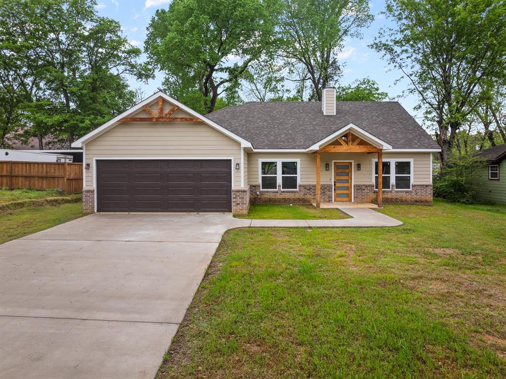 Welcome to this stunning new construction home in the heart of Pittsburg, Texas! Featuring 3 spacious bedrooms and 2.5 bathrooms, this beautifully designed home offers the perfect blend of comfort, style, and functionality. Step inside to an inviting open-concept floor plan that creates a seamless flow between the living, dining, and kitchen areas—perfect for entertaining guests or enjoying everyday life. The thoughtfully designed layout also includes a large laundry room, providing extra space and convenience for busy households. Ideally located near the high school and local park, this home offers easy access to everyday amenities while still giving you the feel of small-town charm. Whether you're looking for a family home or a modern new build in a great location, this property checks all the boxes.