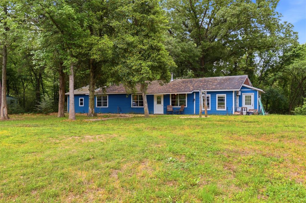 Welcome to your private slice of country living! This charming ranch-style home sits approximately halfway back on 12 beautiful acres, offering peace, quiet, and plenty of privacy. The home features 4 bedrooms, 1 bathroom, plus an additional bedroom or office space—providing flexibility for your needs.
The cozy living room is anchored by a wood-burning stove, creating a warm and inviting space that helps heat the home. Outside, the property is full of opportunity with multiple storage buildings, a greenhouse, a pole barn, and a detached one-car garage. One of the storage buildings even includes a unique underground concrete bunker room.
The land itself is a standout feature, with 12 acres of mostly mixed hardwoods—perfect for enjoying nature, recreation, or future possibilities. Whether you're looking for a quiet homestead, a hobby farm, or an investment opportunity, this property offers endless potential.
*Some photos have been virtually staged and or modified for presentation*