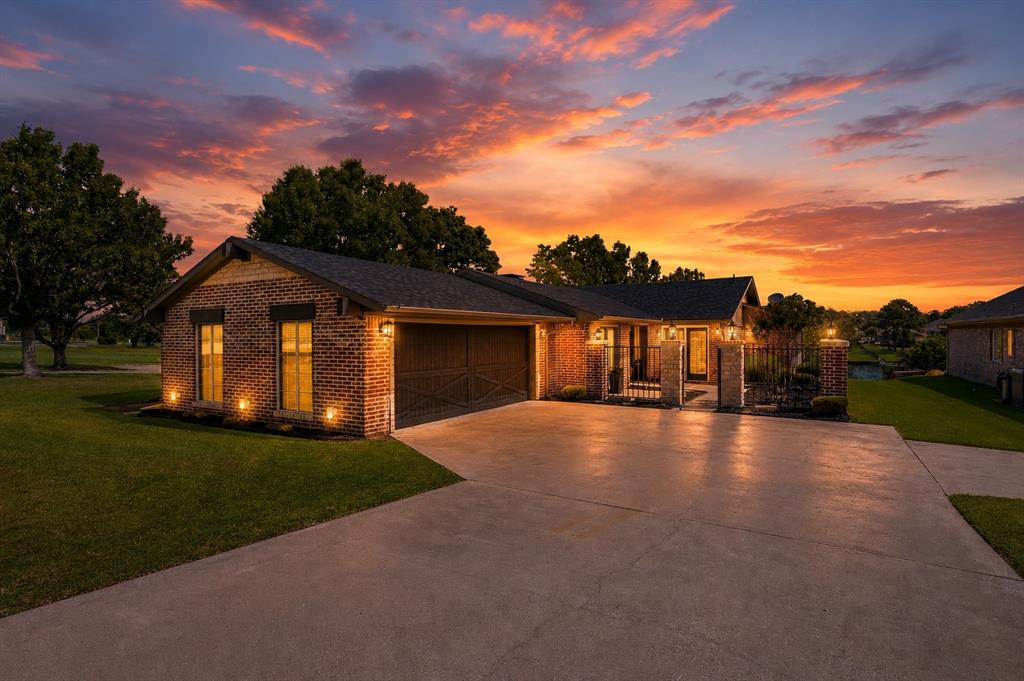 Welcome to lake life at its finest at 533 Kiowa Dr W in Lake Kiowa, TX! 
This beautifully updated home offers the perfect blend of comfort, space, and stunning waterfront living. Featuring 3 private ensuite bedrooms, each with its own bathroom, plus a spacious bunk room (or 4th bedroom), there’s room for everyone to relax and unwind—making it an ideal retreat for families and guests alike.
Step inside to an open-concept layout filled with abundant natural light, creating a warm and inviting atmosphere throughout. The home has been thoughtfully refreshed with fresh paint and major updates including a new roof, HVAC system, and water heater, giving you peace of mind from day one.
Outdoors, you’ll fall in love with the large backyard overlooking the lake, perfect for entertaining, playing, or simply soaking in the peaceful views. Nestled on a quiet cove, the property also features a private boat dock, offering easy access to the water for boating, fishing, or sunset cruising. 
Whether you're looking for a full-time residence or the ultimate weekend escape, this home delivers the perfect lake lifestyle with space, privacy, and unforgettable views.
Your Lake Kiowa dream home is waiting—come experience it for yourself!