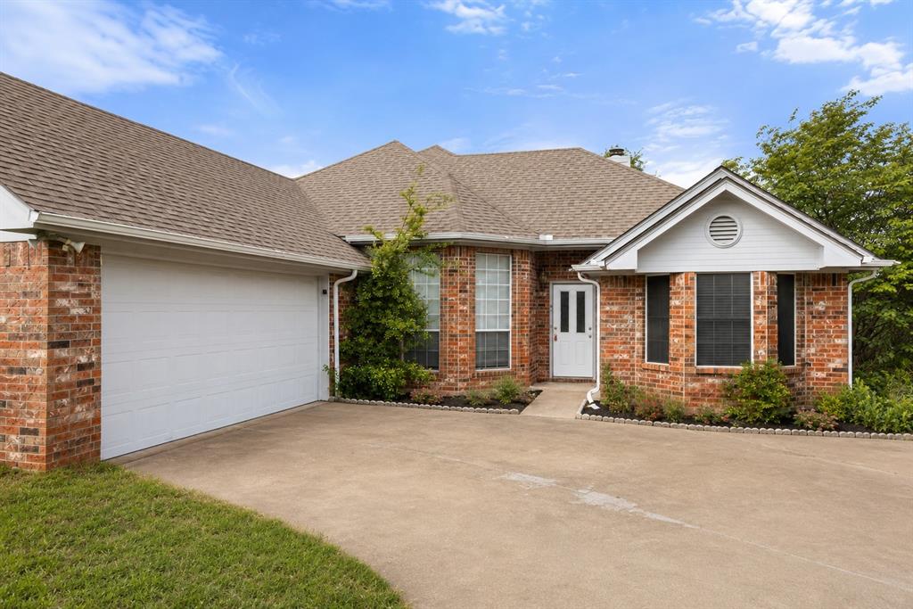 Welcome to 3905 Frisco Circle in Granbury, Texas—a wonderful home offering comfort, style, and serenity. This charming home features 3 spacious bedrooms, 2 full bathrooms, and lots of living space. The open layout includes a vaulted ceiling in the living room, a cozy fireplace, and a formal dining area ideal for entertaining. The kitchen is well-equipped with ample cabinetry, a breakfast nook, and durable flooring through ought. The oversized primary suite boasts a sitting area, dual closets, a jetted tub, separate shower, and double vanities. Step outside to the large screened-in patio and enjoy views of Comanche Peak and the expansive backyard on a flat, fenced lot with no HOA. Conveniently located near Hwy 144, this home offers a rare blend of tranquility and accessibility, schedule your showing today!
