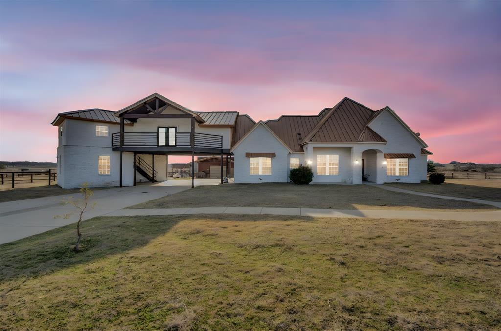 MOTIVATED SELLER! Offering seller concessions with a reasonable offer. Nestled just outside the city limits, this stunning 5-bedroom, 3.5-bath home offers the perfect blend of space and tranquility. With a dedicated office, a separate shop, and three horse stables, it’s a dream for anyone with a passion for equestrian living. The property spans just over 3 acres, complete with a horse arena out back. The home features a durable metal roof and no HOA, giving you freedom and flexibility in a peaceful, rural setting. NO CITY TAXES. You have your 2 septic systems and back patio for gatherings or just for you to sit and watch the sunset.