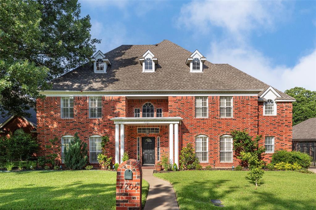 Stunning home on a quiet cul-de-sac in a desirable Arlington neighborhood, zoned to highly sought-after Mansfield ISD. This beautifully updated home offers curb appeal and a light-filled interior with soaring ceilings in the foyer, living room, and dining room. The main living areas feature new first-floor flooring with rich hand-scraped wood in the living room, dining room, office, and primary bedroom. Architectural details include exposed wood ceiling beams in the kitchen and formal living area, plantation shutters, and designer lighting throughout, highlighted by oversized chandeliers and recessed lighting that enhance the home’s scale. The kitchen is both refined and functional, featuring quartz countertops, stainless steel appliances including a double oven, a generous island, custom cabinetry, and a bright breakfast area framed by bay windows overlooking the backyard. A wet bar off the living room is ideal for entertaining or for a dedicated coffee station. A conveniently located powder room and a private office with built-in cabinetry provide everyday comfort and flexibility for working from home. The primary suite serves as a serene retreat with a charming reading nook and a completely renovated spa-inspired bath featuring quartz countertops, custom cabinetry, a waterfall soaking tub, and a beautifully designed glass-enclosed shower with designer finishes. All bedrooms include walk-in closets, plantation shutters, and bladeless ceiling fans for modern comfort. Outdoor living is designed for year-round enjoyment with a pergola-covered kitchen, built-in grill, refrigerator, shelving, brick pavers, and a fire pit—creating a true extension of the living space. A gated driveway leads to a two-car garage with additional rear parking. Quick possession is available.