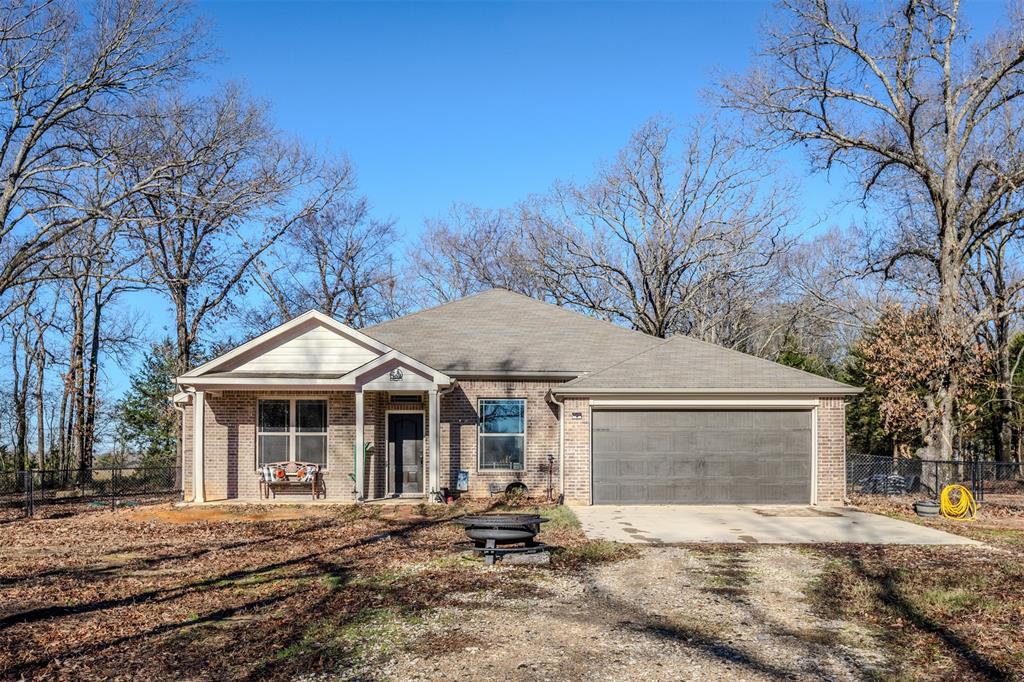 3 Bed - 2 Bath - Flex Space - Pool - 6+ Wooded Acres - Edgewood ISD

Escape to the peace and privacy of country living with this beautifully maintained 3-bedroom, 2-bath home, set on over 6+ wooded acres in desirable Edgewood ISD. Inside, the open-concept layout offers seamless flow between the kitchen, dining, and living areas — perfect for family life or entertaining. A flexible bonus room adds extra versatility, ideal for a home office, playroom, or guest space.  Step outside to your own private oasis featuring a sparkling pool, surrounded by mature trees that provide both shade and seclusion. The expansive, fully fenced property offers room to roam, with private trails ideal for walking, hiking, or hunting.  Need space for tools and equipment? A permanently installed storage container with an attached 40x12 lean off to one side offers ample covered storage for your gear, tractors, or outdoor toys.  Whether you're looking for a weekend retreat or a full-time homestead, this property offers the perfect blend of comfort, function, and natural beauty.