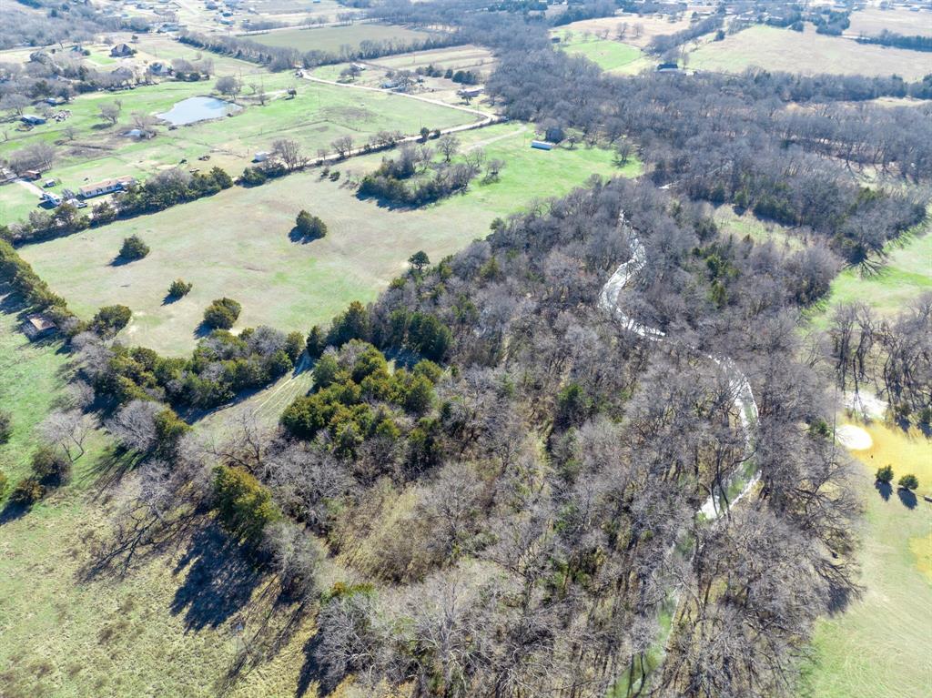 Introducing a unique opportunity to own over 22 acres of pristine land, where your imagination knows no bounds. This expansive canvas invites you to bring your vision to life from the ground up. Tucked away in a tranquil setting, this property offers the perfect blend of seclusion and convenience. As you explore the vast expanse of this land, you'll discover all of the hidden gems. Whether you dream of building your dream home, developing an agricultural haven, or simply embracing the freedom to shape this land into your own private retreat, the possibilities are truly endless. Don't miss out on this remarkable opportunity to craft your own masterpiece. Seize the moment and make this blank slate your own.