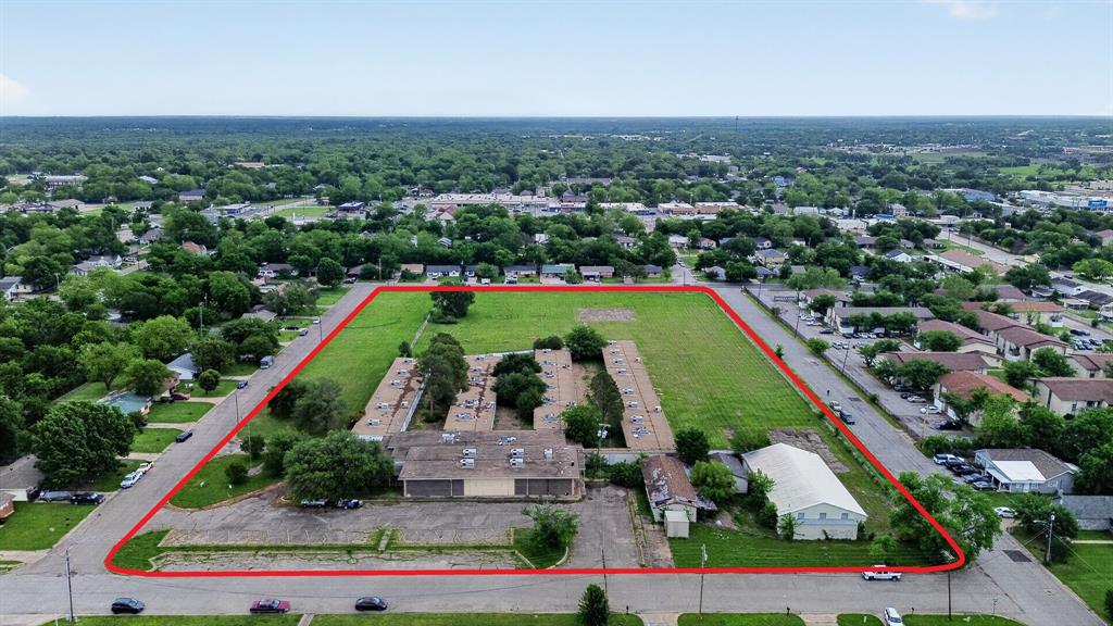 A 7.7-acre infill redevelopment opportunity located at 3005 Division St & King St in Greenville, TX. This land-only offering consists of two adjacent parcels: a 3.87-acre tract at 3005 Division St and a 3.83-acre leveled tract on King St. The site features a ±47,826 SF building footprint, with the property being offered for land value. City water, city sewer, and electricity are available on-site. 
The assemblage is positioned for multifamily or assisted living redevelopment. Current zoning is split: King St is currently zoned Multi-family and 3005 Division St is zoned SF-2; however, the City’s Future Land Use overlay designates the entire 7.7-acre footprint for Multi-family use. Located two blocks from the Wesley St corridor with proximity to downtown Greenville and Joe Ramsey Blvd - Hwy 69. Site features dual access and no known easements. All redevelopment plans are subject to buyer verification and city approval.