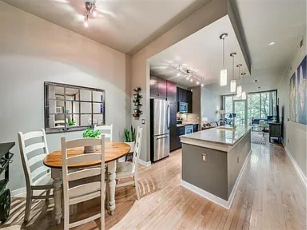 Welcome to sophisticated Uptown living at its finest in the heart of vibrant State Thomas. This beautifully designed 1-bedroom, 1.5-bath residence at 2950 McKinney Avenue #211 offers 1,105 square feet of stylish comfort with an open-concept layout perfect for everyday living and entertaining. Expansive windows fill the space with natural light, while the spacious living and dining areas flow seamlessly into the well-appointed kitchen featuring generous cabinetry and ample prep space. The oversized primary suite provides a true retreat with a spa-inspired bath and large walk-in closet. A rare additional half bath adds convenience for guests. Washer, dryer and fridge to convey. Enjoy the ultimate lock-and-leave lifestyle just steps from Uptown’s premier dining, shopping, Katy Trail, and nightlife. Experience luxury, walkability, and convenience all in one exceptional address.