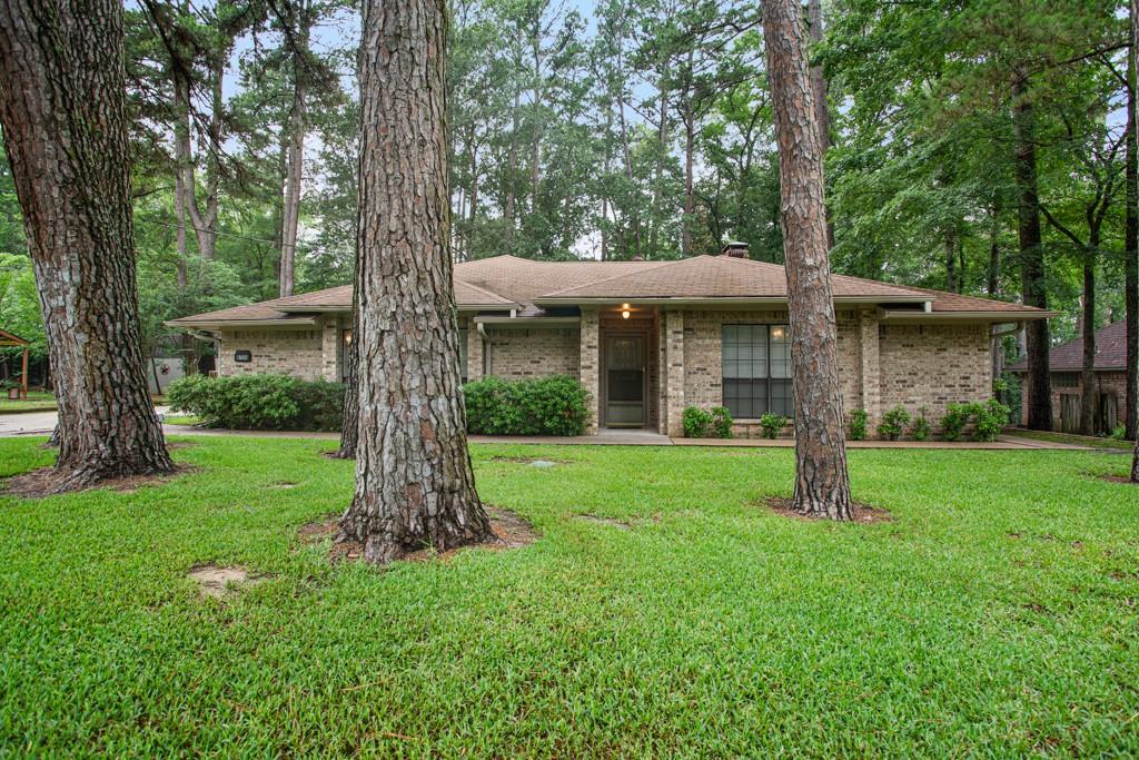 Come see this Traditional Ranch Home set in a woodland paradise. As it sits on a large lot with gorgeous pine trees and a natural backyard. Enjoy the large open family room with vaulted ceilings and fireplace that flows into a multi-functional bright morning room with skylights and a wall of windows. The Primary shower was renovated last year. There are two walk-in closest and two split vanities. The Kitchen offers lots of built-ins and storage space as well as a pantry. The garage has a storage and workshop with plenty of built-in cabinets. There is even an RV or Carport and a Sprinkler System. The home has been well maintained. A Lennox Attic handler was installed in 2019 and a Goodman compressor in 2020. This is the perfect entry into Hideaway Lake, a gated community with lots of amenities.