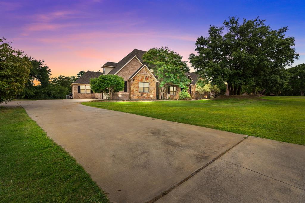 **NOW ACTIVE  Unparalleled Space, Privacy & Luxury in Fort Worth**

Welcome to an extraordinary opportunity to own a stunning private estate offering luxury, space, and peaceful country living—all with convenient access to Fort Worth.

Situated on 5.5 breathtaking acres, this exceptional two-story home delivers the perfect balance of sophistication and comfort.

**7 Bedrooms - 5.5 Bathrooms - Pool - 5.5 Acres**

Step inside and experience soaring vaulted ceilings, rich hardwood floors, and an expansive open-concept design filled with natural light. The grand living area is anchored by a dramatic floor-to-ceiling stone fireplace, creating a warm and inviting centerpiece for entertaining and everyday living.

The chef’s kitchen is built to impress, featuring:
• Custom white cabinetry
• Walk-in pantry
• Premium stainless steel appliances
• Double oven range
• Built-in wine refrigerator
• Oversized island with bar seating

The luxurious primary suite offers a true retreat with a spa-inspired ensuite bath complete with a freestanding soaking tub, oversized walk-in shower with dual shower heads, and elegant designer finishes.

With seven spacious bedrooms and 5.5 bathrooms, this home provides exceptional flexibility for large families, guests, home offices, or multigenerational living.

Step outside into your own private oasis. The sparkling pool, mature trees, and sprawling acreage create endless possibilities for entertaining, recreation, or simply enjoying peaceful Texas sunsets.

This rare property offers luxury living, unmatched privacy, and room to live the lifestyle you’ve been dreaming of.

**Schedule your private showing today—properties like this don’t stay on the market long.**