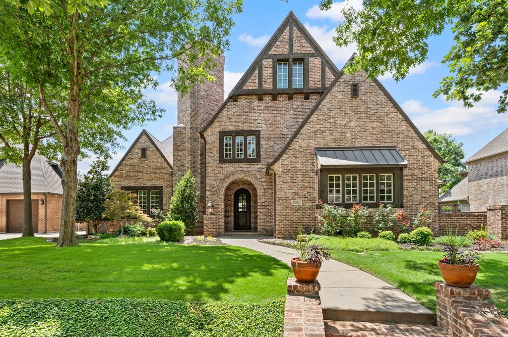 Welcome to this stunning home in the sought-after Colleyville neighborhood of Whittier Heights.  Rich hardwood floors flow throughout the thoughtfully designed floorplan, complemented by an oversized 3-car garage and exceptional indoor-outdoor living spaces. The spacious primary suite is a true retreat, featuring a cozy fireplace, dedicated desk area, oversized walk-in closet, and a versatile bonus room perfect for a private office, workout space, or nursery. A secondary bedroom is conveniently located downstairs, offering flexibility for guests or multigenerational living. Designed for entertaining, the home features a beautiful upstairs bar area with built-in cabinetry, gameroom and a dedicated home theater. Upstairs, you’ll also find two generously sized bedrooms, each with private en suite bathrooms. An additional upstairs living area features sliding doors that open to a balcony overlooking the sparkling pool, while the spacious covered patio below offers a fireplace and built-in grill—perfect for year-round entertaining. The backyard is a private oasis complete with lush landscaping, charming stone pathways, a beautiful pool with water features, and a relaxing hot tub. Homeowners enjoy the best of both worlds with the option to attend Keller ISD or take advantage of open enrollment to GCISD. This exceptional Whittier Heights property truly offers luxury living in an unbeatable location.