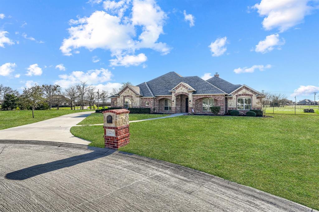 Nearly 2 acres of open space, a sparkling pool retreat, and effortless indoor-outdoor living—this exceptional property in Caddo Mills brings laid-back luxury to the countryside. Tucked away in one of the area’s most charming communities, it offers the peaceful feel of a private getaway with the convenience of nearby town amenities, all with no HOA and lower taxes.

Inside, over 2,800 square feet of thoughtfully designed living space blends comfort and sophistication. Rich hand-scraped hardwood floors, plantation shutters throughout, and abundant natural light create a warm yet airy atmosphere. The flexible layout includes 3 bedrooms, 2.5 baths, two dedicated office spaces, and two dining areas—designed to easily accommodate gathering, entertaining, and modern work-from-home living. Updated wired data portals throughout the home provide seamless connectivity, making remote work, streaming, and everyday convenience effortless.

The primary suite offers a true private retreat, complete with a spacious walk-in closet and an adjoining flex room that can serve as a nursery, quiet sitting area, media room, or an additional office.

Outside, the setting feels like a personal resort. A newly added outdoor pavilion creates the perfect extension of the home, featuring a cozy fireplace, built-in grill, refrigerator, and automatic electronic shades for year-round comfort. Just beyond, the pool and spa create an inviting backdrop for summer afternoons or relaxed evenings under the stars.

The impressive 1,200-square-foot shop adds even more functionality, equipped with multiple voltage options for equipment or projects, along with a convenient toilet area—ideal for hobbies, storage, or workspace.

Located within the highly regarded Caddo Mills Independent School District, this property offers a rare balance of space, privacy, and elevated everyday living. Homes that pair acreage, resort-style amenities, and thoughtful modern upgrades like this rarely come available.