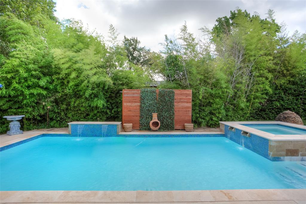 Pool Party Season is Coming! Are you ready? Welcome to refined Fort Worth living in this exceptional 4-bedroom, 4-bath luxury home, ideally situated in a highly desirable Fort Worth zip code, near the prestigious Shady Oaks and Rivercrest Country Clubs, and close to the Cultural District and Clearfork. Blending timeless architecture with modern comfort, this residence offers elegance, functionality, and an unbeatable location with access to some of the city’s best dining, shopping, and entertainment.

The home is filled with natural light, highlighting the open-concept layout designed for effortless entertaining and everyday living. Soaring ceilings and expansive windows create a bright, airy atmosphere, while the chef’s kitchen—featuring granite countertops, custom cabinetry, double ovens, and a gas range—anchors the home with style. The sleek gas fireplace adds warmth and sophistication, creating an inviting setting for gatherings or quiet evenings in.

The primary suite serves as a private retreat with a peaceful sitting area, spa-inspired bath, and two walk-in closets. A dedicated home office adds flexibility and convenience. Upstairs, a remarkable 2,400-bottle wine room with its own lounge pairs with a spacious loft-style living area and wet bar—an exceptional space for hosting or relaxing at home.

Step outside to your private backyard oasis—perfectly timed for summer. Enjoy long days by the sparkling pool, unwind in the spa, or relax under the shaded arbor. The fountain and putting green add charm and leisure, creating a seamless extension of the home’s living space and the ultimate setting for unforgettable gatherings.

Located with convenient access to downtown Fort Worth and top-rated private schools, this home delivers both luxury and livability in a premier location.

From morning coffee on the patio to sunset swims and lively evenings by the pool, this elegant residence offers the perfect blend of location, lifestyle, and summer-ready living.