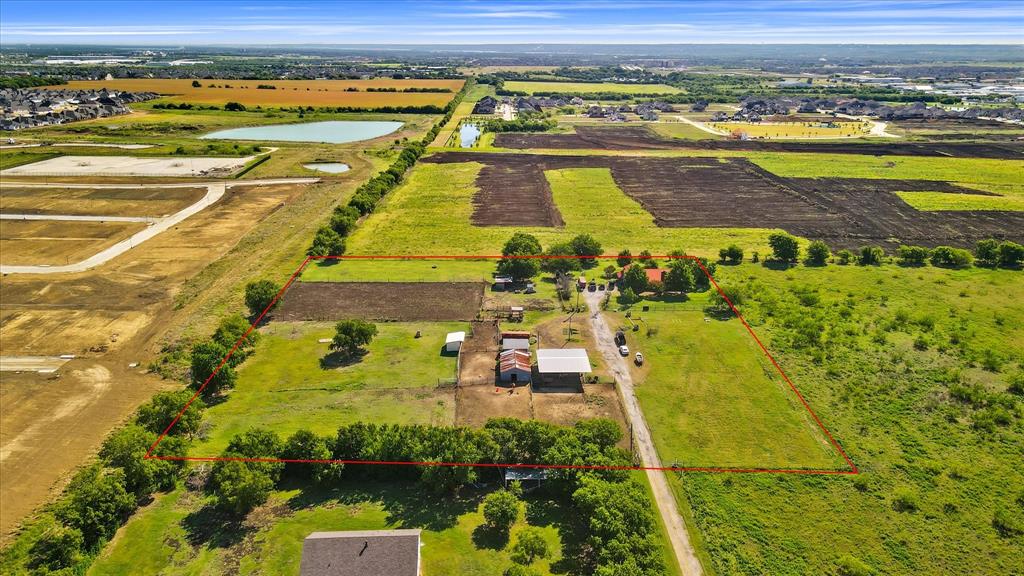 INVESTORS, LOOK NO FURTHER!  THE NEXT HOT SPOT in the ever growing City of Mansfield.  The possibilities are endless.  This great 5 acres will sit perfectly on the corner of 2 minor arterial roads just south of the New M3 Ranch and west of the new Bird Song subdivision.  This 5 acres is Zoned PR (Pre-Development) in the City of Mansfield which allows this land to be developed for residential, commercial or industrial purposes.  This zoning classification does not infer any specific indication of future land uses other than its projection for some form of residential, commercial or industrial development.  Please review documents in the transaction desk for projects and developments that are currently being developed right next to this property.  Aerial Video in Virtual Tours.