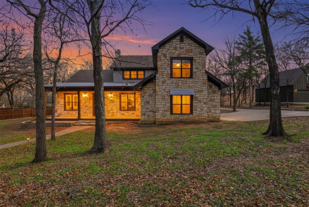 Nestled on approximately .75 of an acre just minutes from Lake Weatherford, only five minutes to H-E-B, 15 minutes to downtown Weatherford, and just 35 minutes to downtown Fort Worth, this oak-covered property offers the perfect blend of privacy and convenience. The wrought-iron fenced backyard opens space for natural scenery to flood into your home. A sparkling pool, cozy fire pit, and even an axe-throwing area give you and outdoor living space to double the usability of this property. Beyond the fence, wide-open green space invites frequent visits from roaming deer. The primary suite is located on the main level and includes a spa-style ensuite with a separate shower and soaking tub, dual water closets, and a large walk-in closet. Hardwood floors and striking custom trim highlight the office, formal dining, and main living areas, while a convenient half bath near the back door makes poolside entertaining easy. The kitchen offers abundant cabinetry and counter space with views stretching deep into the backyard—perfect for keeping an eye on outdoor activity. Upstairs, you’ll find spacious bedrooms with walk-in closets, including a private bedroom and full bath ideal for guests, a mother-in-law, or a college student, plus a large game room that works beautifully as a media space, home gym, or hobby area and easily fits a pool table. This exceptional home delivers space, style, and an unbeatable setting—and is priced to sell fast.