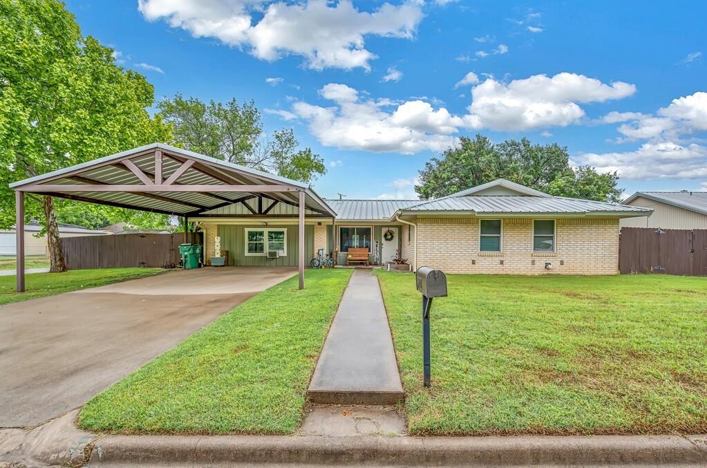 Welcome to this beautifully updated 3-bedroom, 2-bath home located in the highly sought-after Clifton ISD. This property blends comfort, charm, and modern functionality, with a brand-new family room addition offering over 500 square feet of extra living space for gathering, entertaining, or relaxing.
Inside, you’ll find a bright, open layout featuring a cozy living area, stylish finishes, and a spacious kitchen with white cabinetry, stainless steel appliances, and a large island perfect for meal prep or casual dining. The adjoining dining space flows seamlessly into the new family room, creating an expansive, versatile area ideal for movie nights, play space, or hosting guests.
The bedrooms are warm and inviting, including a comfortable primary suite with its own private bath. Additional rooms are perfect for children, guests, or a home office. Both bathrooms are well-appointed with updated vanities and clean, modern touches.
Step outside to enjoy a covered deck overlooking a fenced backyard, complete with room for kids, pets, and outdoor fun. A storage building adds convenience, and the metal-roof carport provides sheltered parking.
Located in a quiet neighborhood within Clifton ISD, this home offers the perfect blend of space, updates, and small-town Texas living.  This is a must-see property, call for you private showing!
