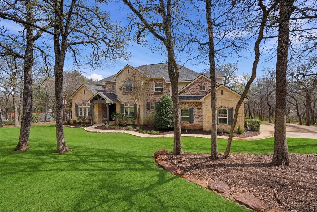 Welcome to peaceful country living in the heart of Pilot Point’s renowned horse country. Situated on nearly 1.5 heavily treed acres, this beautifully designed home offers the perfect blend of luxury, privacy, and character just outside the city.


A custom-trimmed entry with soaring ceilings opens into an expansive living area featuring rustic beams, a stunning stone fireplace, and a full wall of windows overlooking the serene backyard. The kitchen is designed for gathering, centered around an oversized island and a gas range with a striking brick surround, plus a dining area with a built-in banquet for casual meals and entertaining.  This home may qualify for a lender-paid incentive of up to $8,000 toward closing costs or a rate buy-down, subject to buyer qualification and lender approval. Buyer is not required to use the preferred lender to purchase the home. Contact listing agent  for full details.


Thoughtful details throughout the home add warmth and personality, including custom board and batten accents, a dedicated home office with stamped concrete floors, and a first-floor media room. The spacious primary suite serves as a true retreat, complete with split his and her bathrooms, a dual-entry shower, and a built-in storm shelter discreetly located within the suite.


If you’ve been searching for space, privacy, and a home that truly feels like an escape, this exceptional property in Pilot Point delivers the best of country living with refined style.