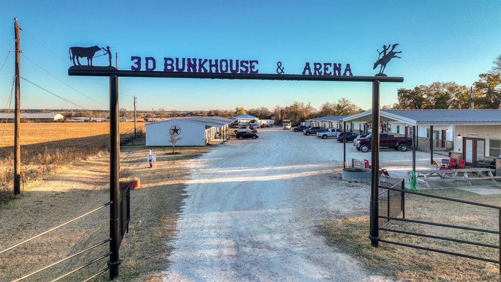 Welcome to 3D Bunkhouse, a rare investment opportunity in the heart of Stephenville—widely known as the Cowboy Capital of the World and home to the thriving TSU community. This unique multifamily property combines residential living, short-term rental income, and equine-focused amenities, making it an exceptionally versatile asset in one of Texas’s most sought-after rodeo and university markets. Located just over an hour from the Dallas–Fort Worth Metroplex, Stephenville offers the charm of a small Texas town with the steady energy and demand generated by TSU students, faculty, rodeo athletes, and traveling competitors. This strong tenant base creates consistent occupancy and long-term investment security. Community & Amenities 3D Bunkhouse is designed to accommodate a wide range of residents and guests. The property features full RV hookups ideal for short-term visitors, rodeo travelers, and event participants. On-site conveniences include a laundry facility, snack station, and secure mail delivery for tenants. The property also offers multiple income-producing amenities, including established short-term rental units, large fully covered horse stalls, storage units, and premium equestrian facilities. Riders and competitors benefit from a 150' x 200' outdoor roping and riding arena, a 60' round pen, and a concrete tie wash area, creating a highly attractive environment for those involved in the equine and rodeo industries.