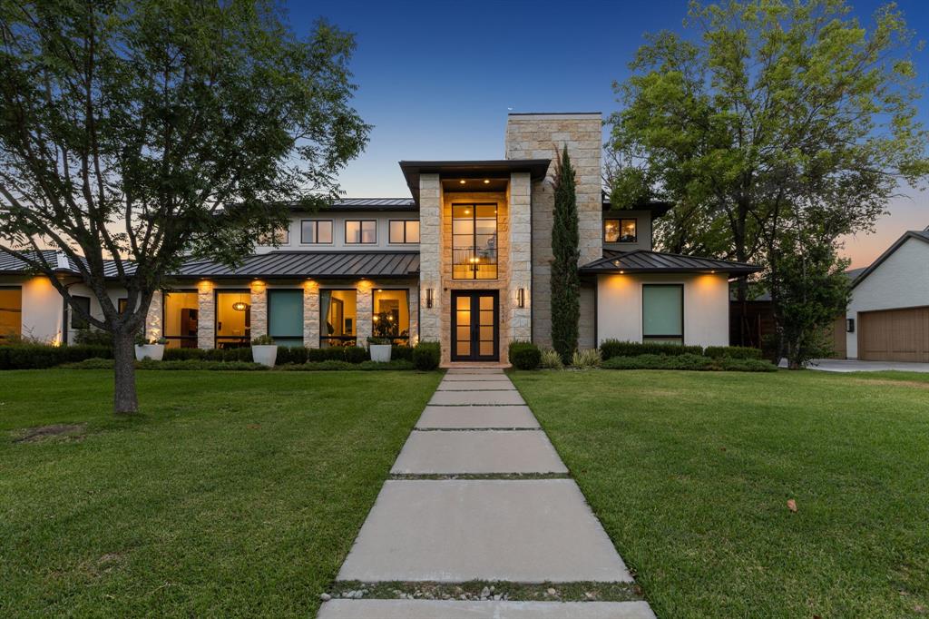 Pristine Ron Davis Custom home in North Dallas Private School Corridor. The Lamplighter School and Hockaday School are right in your backyard and it's only a 6-min drive to St. Mark’s School.
Highlights of the home include a downstairs master bedroom with a spa bath and an oversized wardrobe, a second kitchen, a study with sliding barn doors and a hidden craft room, a  temperature-controlled glass wine room,  a gourmet kitchen with Thermador appliances, a butler's pantry, media room, a wet bar, workout room, outdoor kitchen, and a game room. Key features include a durable metal roof, 7.1 Dolby Surround Sound and TV wiring indoors and out, Control 4 home automation, continuous hot water circulating system, efficient Zoned 16 SEER AC, and professionally landscaped front yard with turf in the back. It is truly a perfect blend of luxury and cozy living.