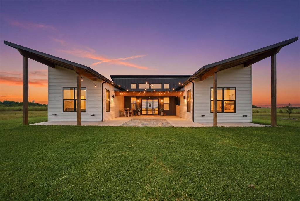 Discover the freedom of country living on 3.3+ acres outside city limits. Offering privacy, flexibility, and room to grow, this property presents a rare opportunity for those seeking space without sacrificing convenience. Whether you’re looking for a place to enjoy a quieter lifestyle, create a family compound, or build your dream home, the possibilities are endless. Inside, thoughtful design details elevate the home’s character, including custom white oak cabinetry, a designer wallpaper accent in the half bath, a versatile secondary bedroom with a built-in Murphy bed, and an impressive 8-foot bifold door that creates a seamless connection between indoor and outdoor living. A unique highlight of the property is that power is already in place for a future main residence, creating the opportunity to live in the existing custom home while building your dream home on the remaining acreage. The existing home can continue to serve as a guest house, multigenerational living space, rental opportunity, or private retreat long after construction is complete. The property also features a 1,200-square-foot shop, offering abundant space for storage, hobbies, equipment, or a workshop. With open acreage and plenty of room to expand, this property provides the flexibility to create a lifestyle tailored to your needs. Enjoy peaceful country surroundings while remaining conveniently located near shopping, dining, and schools. Rarely does a property offer this combination of immediate functionality and future potential. Looking to build your dream home? The owner is a custom home builder in the Waxahachie area, offering a unique opportunity to explore future building possibilities on the property.