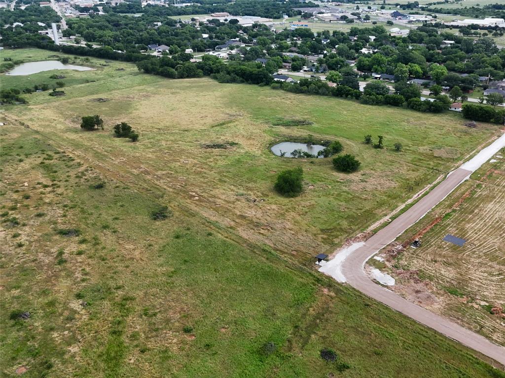 This 13.271-acre ag-exempt tract just outside the city limits of Whitney offers the perfect blend of privacy, natural beauty, and development potential. The property features a large pond, creating a scenic focal point that attracts  wildlife including deer, birds, and other native species while providing a peaceful water view. With its lush meadow and plenty of open space, this property would make an exceptional homesite for those looking to build a custom home, while still being conveniently located near town.

Beyond its appeal as a private homesite, this tract also presents a unique opportunity for investors or developers. The acreage and layout lend themselves well to potential subdivision into smaller tracts, subject to county and local approvals. The growing demand for properties in the Whitney area makes this an attractive opportunity for those looking to create multiple homesites or hold land for future appreciation.

Located just minutes from the amenities of Whitney and the recreational opportunities of Lake Whitney, this property combines country living with convenient access to town, dining, shopping, and outdoor recreation. Whether you're searching for a private place to build or looking for your next land investment, this property offers flexibility, scenic features, and long-term potential.