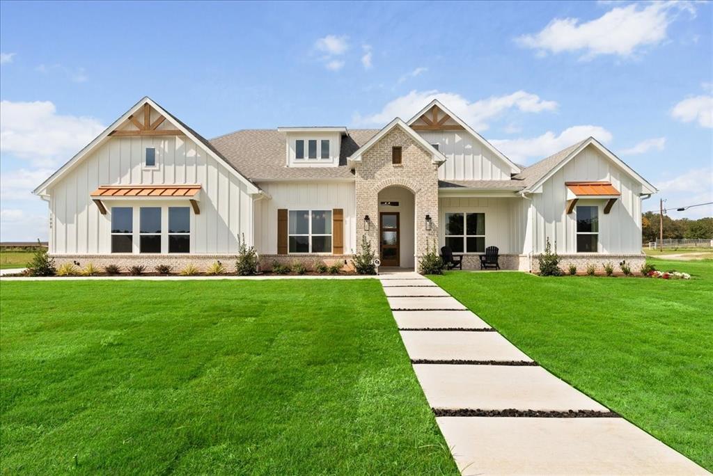 MLS# 21210891 - Built by Doug Parr Homes - Ready Now! ~ Discover this stunning new construction single-family residence in the desirable Brock Heights subdivision, featuring 4 spacious primary bedrooms and 3 full bathrooms within 2,668 square feet of thoughtfully designed living space. Built in 2024, this traditional-style home boasts an open floorplan, enhanced by decorative lighting and a cozy stone fireplace in the family room. The expansive kitchen includes a kitchen island and pantry, perfect for culinary enthusiasts. Enjoy the convenience of a dedicated dining area and a large backyard, ideal for outdoor activities. Additional highlights include a covered patio, central heating and cooling systems, and a 3-car garage. Located in the Brock ISD, with elementary to high school options nearby, this home is truly a gem ready for its new owners.