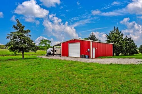 Prime investment opportunity! 29.991 unrestricted acres with FM 996 frontage that lies directly in the path of proposed North Texas Tollway. Lies within the Pottsboro ISD. City water. Current climate controlled shop with bathroom and RV pad ready to hook up while you draft your development plans or build your dream house.