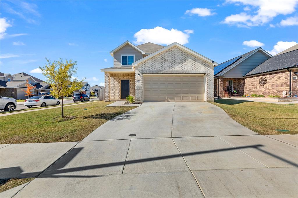 Welcome to this beautiful residence boasting corner lot and pond views nestled in a vibrant new community. Love where you live in Hanna Ranch in Everman, TX! The Woodland floor plan is a spacious 2-story home with 4 bedrooms, 2.5 baths, game room, and 2-car garage. With a bar top kitchen open to the family room, you'll love entertaining in this home! The gourmet kitchen is sure to please with cabinetry, granite countertops, stainless-steel appliances! Retreat to the first-floor Owner's Suite featuring a beautiful bay window, granite countertops, Shower pan ilo tub, and spacious walk-in closet! Enjoy the great outdoors with full sod, and a sprinkler system! Don't miss your opportunity to call and schedule a visit today!  All information deemed reliable but not guaranteed. Buyer and buyer's agent to verify all information herein.