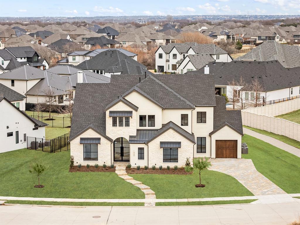 Stunning custom home in Prosper! This home has the perfect plan for entertaining. Wide open great room that opens to large, covered patio - allowing for indoor-outdoor parties. Chefs' kitchen has all the latest in appliances and also features a large walk-in pantry. Private owners' retreat that overlooks the back yard, boast a spa like bath with huge walk-in shower and elegant free-standing tub. Study on the front of the home features tall ceilings, French doors, and window that overlook the covered front porch. Two additional bedrooms are located on the first floor. Upstairs features a large game room and media with balcony, adding to your entertaining possibilities. Three additional bedrooms, each with access to bath and walk-in closet, complete the second floor.