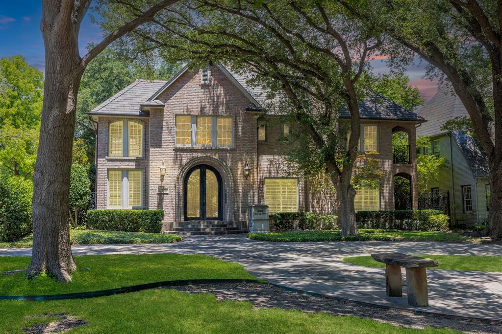 Welcome to 3324 Beverly Drive, a timeless estate in the heart of Highland Park that perfectly blends historic 1929 charm with modern luxury. A gracious 6,300 square feet of living space offers four spacious bedrooms, four full baths, two half baths,  multiple living areas, living room with an elegant fireplace, a private office, and a chef’s kitchen with wood finished cabinetry, granite countertops, soaring ceilings. Outdoors, enjoy serene terraces, balconies, gated drive with detached garage, and even a private putting green—all set on a beautifully treed lot. Just minutes from downtown Dallas and within the award-winning Highland Park ISD, this home delivers unmatched elegance, convenience, and lifestyle.