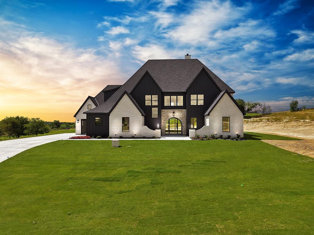 Check out this stunning new listing in the highly sought-after community of Santana Ridge, located within acclaimed Brock ISD. This exceptional Euro-modern home sits on 2 acres and offers 5 spacious bedrooms, 4.5 bathrooms, and a 3-car garage. Showcasing custom finishes, sleek architectural details, and a sophisticated modern aesthetic throughout, this home seamlessly blends luxury, comfort, and functionality. Bring your horses and enjoy the freedom of country living with plenty of room to roam, all while being just minutes from the conveniences of town. This rare opportunity offers the perfect combination of luxury, space, and privacy in one of Parker County's most desirable communities.