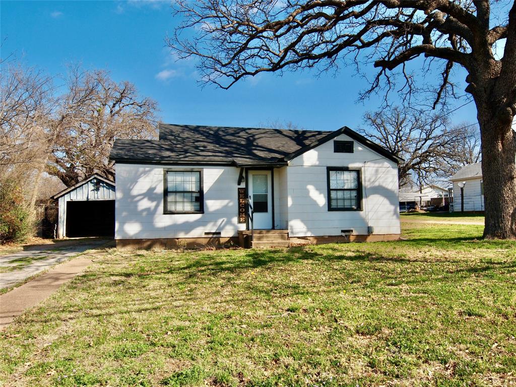 PRICE REDUCED!! Modern amenities in one darling package!!! Delightful, move-in-ready and recently updated one bedroom, one bathroom, one car detached carport home near Crestview Elementary school INCLUDING a 13 X 10 BONUS ROOM or FLEX ROOM that can be used as a bedroom with the addition of an armoire or dresser. Modern, solid surface wood-look flooring throughout. Recent light gray interior wall paint throughout provides a modern farmhouse vibe. The living room is spacious at 18 X 11 and offers newer windows providing ample natural lighting along with a lighted ceiling fan.  The eat-in-kitchen boasts newer stainless steel appliances including a smooth-surface Whirlpool electric range, built-in Whirlpool microwave, Whirlpool dishwasher, stainless steel sink, white cabinetry with modern hardware, Formica countertops and the refrigerator conveys. Stackable GE washer-dryer combo conveys. Newer electric water heater with a pan and overflow drain line. Super-cute bathroom with a tub-shower combo, 18 inch tile surround, vanity with sink, built-in towel & display shelving and toilet. Lighted ceiling fans and mini-blinds throughout. Central heat & air. Newer composition roof. Storm doors. Covered porches. Oversized backyard with mature shade trees, a wood privacy fence on one side and a chain-link fence on two sides. Metal storage container in the northwest corner of the backyard conveys to the New Owner.  You'll fall in love with this darling, cottage-style home located in an established neighborhood near schools, churches and the post office. Take this rare opportunity to own your own low maintenance personal residence or 100% turn-key rental property before it's gone!