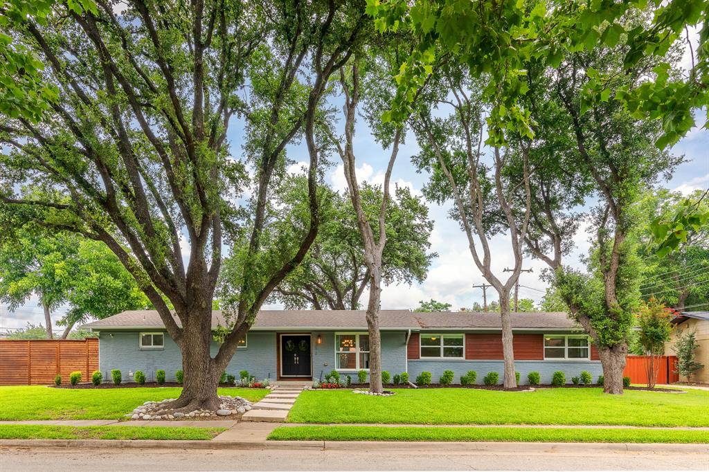 Welcome to 3672 Mid Pines Drive, a beautifully updated and thoughtfully designed home where modern comfort meets outdoor living. Nestled on an oversized lot in a desirable Dallas neighborhood, this property offers the perfect blend of spacious interiors, functional design, and incredible entertainment spaces. From the moment you step inside, you'll appreciate the bright and inviting open-concept floor plan created for both comfort and connection. The expansive living area flows seamlessly into the dining space and kitchen, creating the ideal environment for entertaining guests or simply enjoying time with family. Large windows fill the home with natural light, enhancing the warm and welcoming atmosphere throughout. One of the home's most unique and desirable features is its thoughtfully designed layout. All four bedrooms are situated on one side of the home, creating a private retreat away from the main living and entertainment spaces. This arrangement allows for a perfect balance of activity and relaxation, offering privacy and comfort for family members and guests alike. Take notice of the COMPLETELY REMODELED master bathroom, done in 2025. Step outside and discover a backyard designed to impress. The landscaping was also completely remodeled in 2025. The enormous outdoor space serves as an extension of the home's living area and offers endless opportunities for recreation, relaxation, and entertaining. Golf enthusiasts will love the professionally installed putting green. With an abundance of additional yard space, there's still plenty of room for pets, play equipment, gardening, a future pool, or any outdoor vision you can imagine. Bonus: The fence line has been strategically installed safety bollards to provide additional peace of mind and protection. Come and see this gorgeous property!