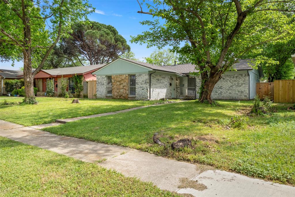Back on market! Previous buyer could not obtain financing. This lovely brick home has everything you have been looking for? For starters the foundation has a lifetime warranty by Olshan, freshly painted inside and out, a showcase beauty with beautiful perfectly trimmed trees surrounding the home for privacy. Another privacy perk... is the newly installed sliding gate wood fence! Rheem HVAC 3 ton unit inside and out replaced in 2020, new voltage regulator installed on unit 2025, insulation in attic was done costs $5000,  Roof replaced in 2020, Rheem water heater replaced in 2024, at&t fiber optic available, updated electrical all sockets, plugs and upgraded breaker panel. New flooring throughout the entire home, both bathrooms are now upgraded, (2025) The kitchen received a facelift with new quartz kitchen counters, recessed lights and kitchen light fixture. Another perk? The fourth bedroom has multiple uses, could be a fourth bedroom since it's vented and has two exits, or you could keep it as a garage with new door installed 2025. The neighborhood is picturesque with pride of ownership in this quiet, tree lined street. It is rare to get a huge backyard with a privacy fence and interior updates and upgrades like these. This is not your fast flip property.