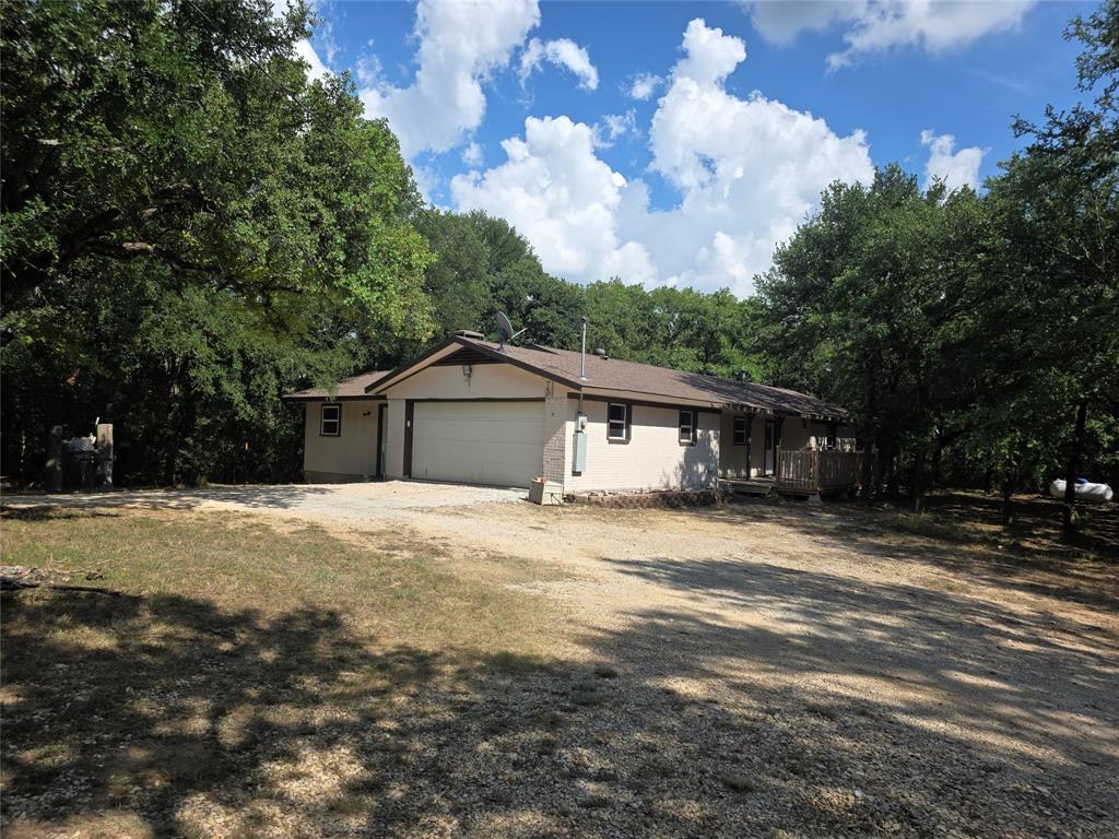 Escape to the peace and privacy of country living on this beautiful 5-acre property between Hillsboro and Whitney, Texas. Nestled among mature trees and surrounded by nature, this remodeled brick home offers the perfect blend of comfort and seclusion. Step inside to find updated finishes, spacious living areas, and a welcoming atmosphere that feels like home from the moment you enter. Whether you're looking for a quiet retreat, room for hobbies, or space to enjoy the outdoors, this property delivers. Enjoy the freedom of country living while still being conveniently located near Whitney and Lake Whitney.
