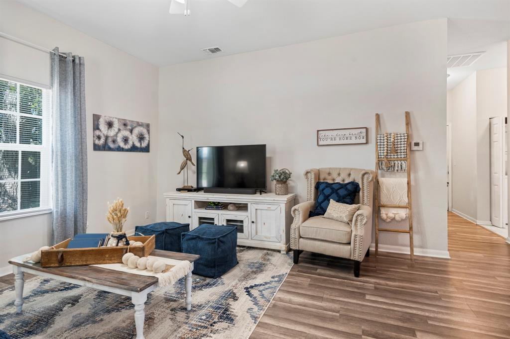 Welcome to this enchanting 2 bed, 1 bath home, perfectly nestled on a .25 acre lot and steeped in history, built in 1920, remodeled in 2021. With 873 square feet of cozy living space, this residence offers a unique blend of classic allure and modern comfort. As you approach the home, a covered front porch beckons you to step inside and experience the warmth of its character. The porch provides an idyllic spot to relax with a morning coffee or welcome guests with its inviting ambiance. One of the highlights of this property is the lush backyard, adorned with magnificent pecan trees. These stately trees provide not only a picturesque view but also offer cool shade during warm summer days. Imagine yourself enjoying the soothing tranquility of nature while savoring the sweet aroma of pecans. Whether you are a first-time buyer looking to embark on homeownership or an investor seeking a new rental property, this home has something special to offer. Stackable Washer and Dryer convey.