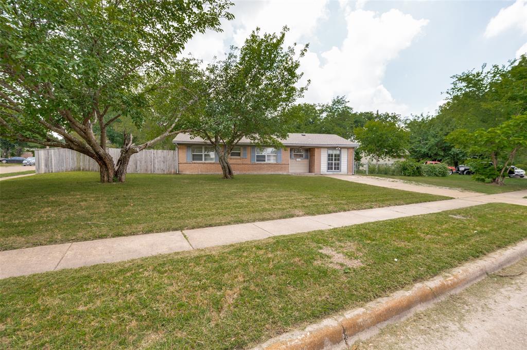 his light and bright 4-bedroom, 1-bath home offers comfortable living with a functional floor plan and plenty of potential. Move-in ready and well maintained, the home features durable laminate and tile flooring throughout—no carpet anywhere.  Situated on a spacious corner lot, the property includes a detached 1-car garage and a covered deck that provides the perfect spot to relax, entertain, or enjoy your morning coffee. The water heater was replaced in 2021, offering added peace of mind.  While there is room for a new owner to add their own updates and personal touches over time, the home is clean, inviting, and ready to enjoy from day one. Conveniently located near schools, shopping, dining, and major commuter routes, this property presents an excellent opportunity for first-time buyers, investors, or anyone looking for an affordable place to call home.