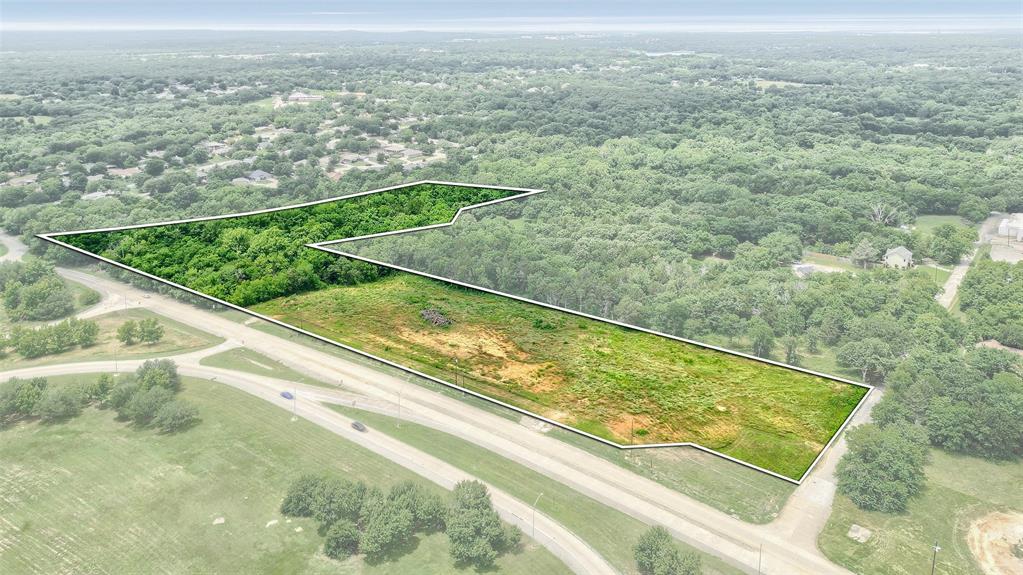 Prime Commercial Development Opportunity – 11.009 Acres in Denison, TX

Positioned in one of Denison’s rapidly expanding commercial corridors, 1401 Flowers Drive offers a rare opportunity to acquire 11.009 acres of prime commercial land ready for development. With excellent visibility and convenient access to major roadways, this strategically located tract is ideal for a wide range of projects including retail centers, industrial facilities, office complexes, or mixed-use developments.

Utilities are available at the street, creating a shovel-ready site that allows developers and investors to move quickly from concept to construction. The property is zoned for commercial use and sits in the midst of a growing business district surrounded by established companies, expanding infrastructure, and new development activity throughout North Texas.

Large commercial tracts in this location are becoming increasingly difficult to find, making this property a valuable investment with strong long-term growth potential. Whether you are planning a large-scale commercial project or looking to secure land in a high-growth market, 1401 Flowers Drive presents a powerful opportunity in the thriving Denison economy.