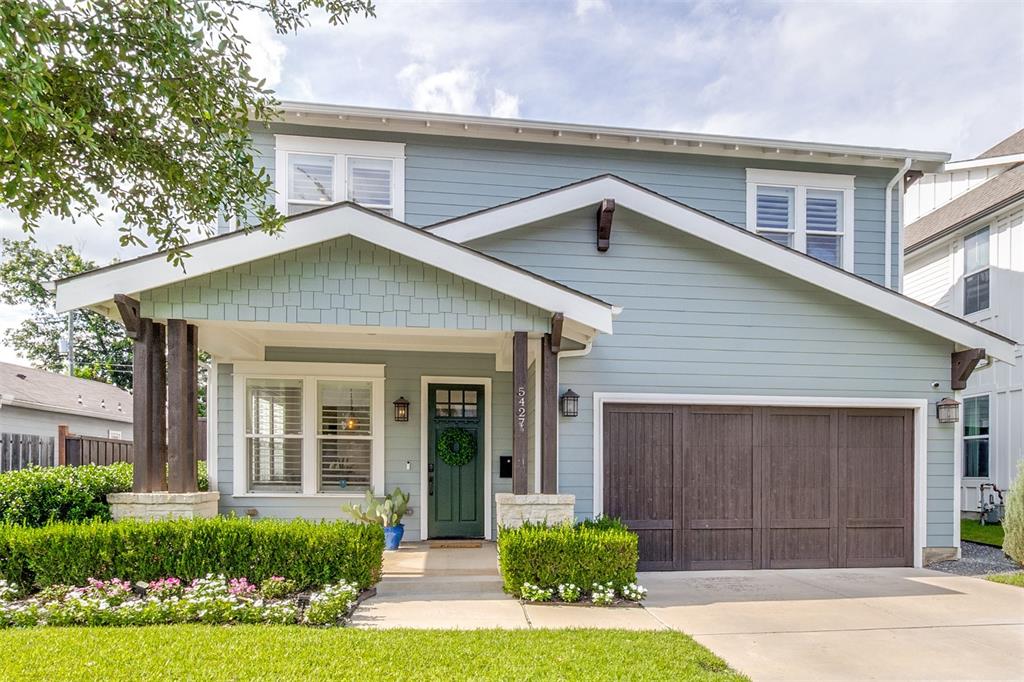 Blending timeless Craftsman charm with modern sophistication, this handsomely refreshed Vickery Place residence offers exceptional living in one of East Dallas’ most energetic and sought-after neighborhoods. Built in 2014 and thoughtfully enhanced by the current owners, the home features newly installed hardwood floors upstairs, fresh paint, an updated backyard fence, and an expanded outdoor entertaining area with pavers.
Designed for both everyday comfort and effortless entertaining, the open-concept floorplan centers around a chef’s kitchen appointed with premium Dacor appliances, crisp designer backsplash, leathered granite island, abundant storage, and a generous walk-in pantry. A stylish wet bar with wine refrigerator serves the adjacent living and dining spaces, creating a seamless flow for gatherings of all kinds.
The inviting den showcases a striking marble-surround wood-burning fireplace and overlooks the wide covered porch and private sunny backyard. The dining room is enhanced by a dramatic bookcase wall offering both character and functionality. A downstairs guest bedroom, currently serving as a study, provides flexibility.
Upstairs, the luxurious primary suite features its own fireplace, private covered balcony, spa-inspired bath with wet room, and a smartly updated custom closet. Two additional oversized bedrooms share a connecting bath, while a spacious utility room with sink adds convenience to the second level.
Enjoy an unbeatable location just moments from Henderson Avenue’s acclaimed dining and entertainment destinations, along with exciting new retail and restaurant developments on the horizon. For those envisioning an even more elevated outdoor lifestyle, a professionally designed pool, pergola, and landscape plan will convey with the property.
A rare opportunity to enjoy classic Craftsman architecture, modern updates, friendly neighbors,highly regarded public schools and exceptional walkability in one of Dallas’ most vibrant neighborhoods.
