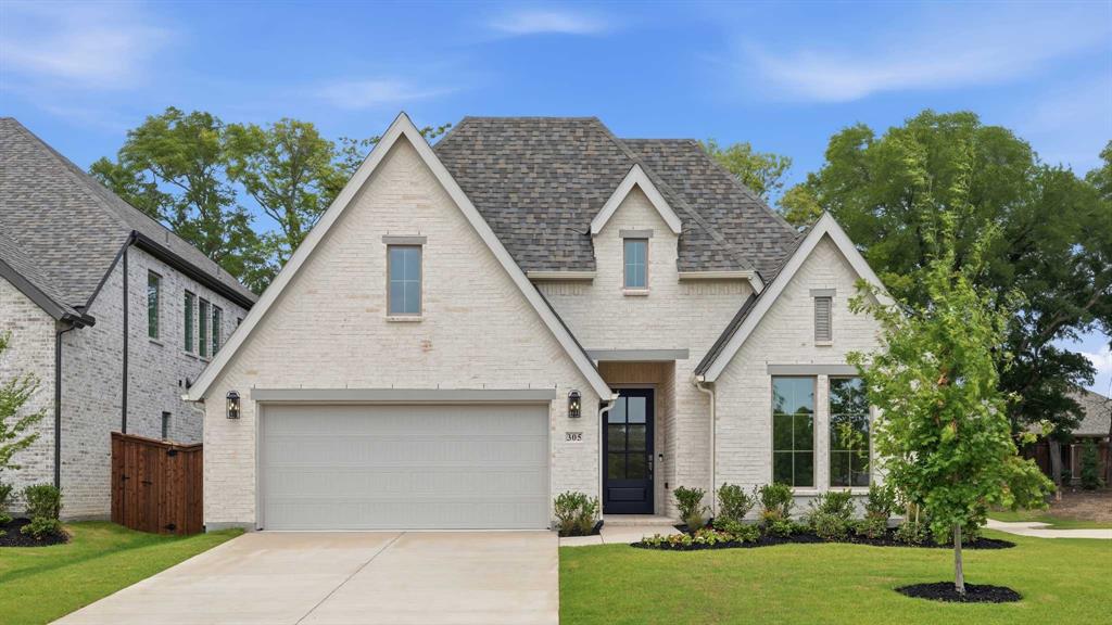 MOVE-IN READY! Extended entryway with 12-foot ceilings. Game room with French doors frame the entry. Spacious family room with a wall of windows and a wood mantel fireplace. Open kitchen offers an island with built-in seating space, a 5-burner gas cooktop, and a corner walk-in pantry. Primary suite with a wall of windows. Dual vanities, a freestanding tub, separate glass enclosed shower and two walk-in closets in the primary bath. Guest suite just off the extended entry with a full bathroom and walk-in closet. Secondary bedrooms with walk-in closets. Utility room with private access to the primary bathroom. Covered backyard patio. Mud room just off the two-car garage.