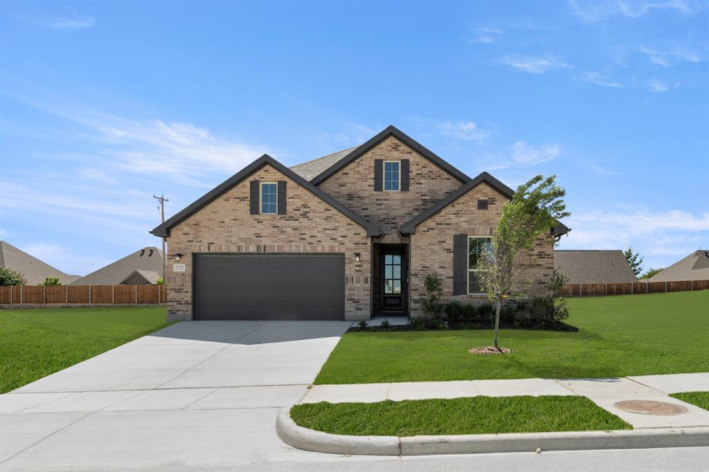 MLS# 21269750 - Built by HistoryMaker Homes - Ready Now! ~ $35,000 use your way! Get 4.99% Fixed Rates, Closing Costs, and more, for a limited time only! Welcome home to this beautifully upgraded one-story featuring 4 bedrooms, 3 bathrooms, and designer touches throughout. From the stunning glass and stained wood front door to the three elegant tray ceilings, every detail adds charm and sophistication. Luxury vinyl plank flooring flows throughout the main living areas, with cozy carpet in the bedrooms for added comfort.  The gourmet kitchen showcases upgraded quartz countertops, champagne bronze fixtures, and added cabinetry in the drop zone for extra storage and functionality. The spacious primary suite offers a spa-like bath with a separate tub and shower plus a large walk-in closet. Thoughtfully designed with both style and practicality, this home is perfect for everyday living and entertaining alike. Don’t miss your chance to make this stunning home yours! Wonderful Aledo schools, low HOA and close to major shopping.