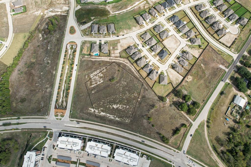 Rare hard corner tract inside the city limits of Waxahachie, offering 6.244 acres of mixed-use opportunity with C-2 and C-3 commercial zoning that supports a broad spectrum of development. The site is cleared, level, and development ready, with city water, sewer, electricity, curbs, sidewalks, and asphalt frontage already in place.

Strategically positioned approximately one mile from US-77 and minutes from the Highway 287 retail corridor, this property provides exceptional access and visibility in a rapidly growing North Texas market. Surrounding residential density and expanding commercial nodes create strong demand drivers for neighborhood retail, service, multifamily, and higher-intensity commercial uses.

Zoning allows a flexible mix of uses, including retail, office, service, multifamily, and other C-2 and C-3 commercial activities. Ideal for developers, investor operators, or build-to-suit users seeking a site with infrastructure in place and a strong demographic pull.

Drive-by viewing permitted; vacant and ready for acquisition. Contact the listing agent for zoning details, due diligence materials, and next steps.