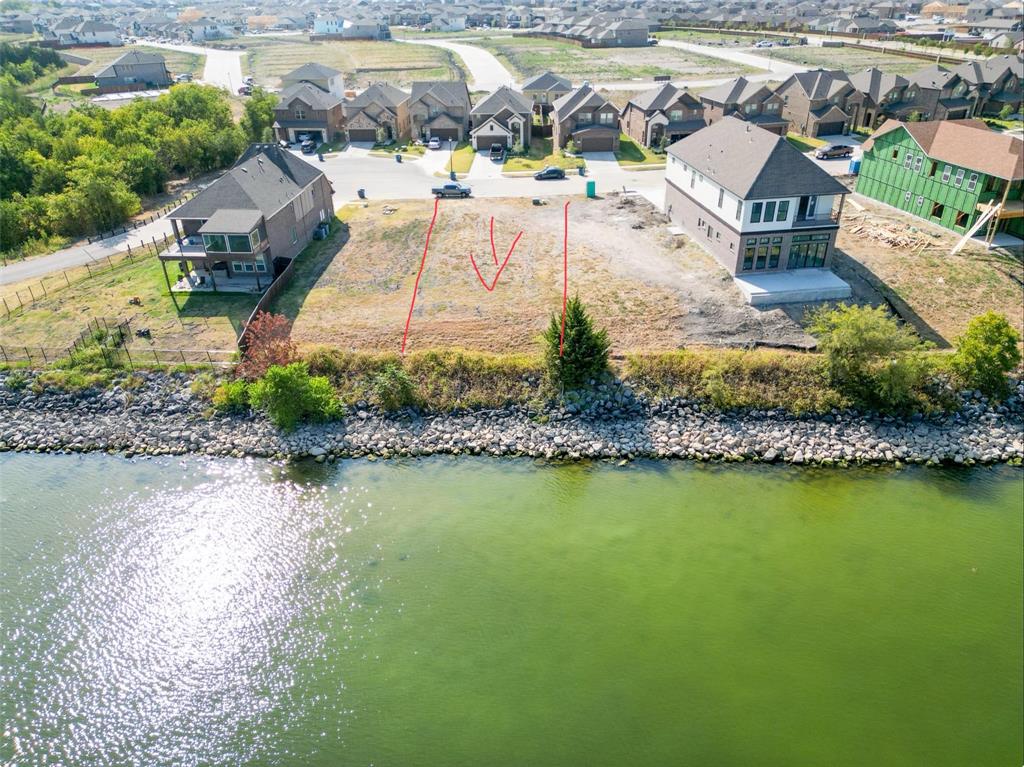 “Great opportunity — this land is priced below its appraised value by Kaufman County!”

It's very rare to find land that is not only lakefront but also allows you to build your dream house almost on the water.

It has a European Mediterranean village feeling, with incredible sunset views of downtown Dallas ,that you can enjoy all year long. All the utilities are already available, and the land is ready to be built on with no deadline for construction. You can choose your own builder; the owner has plans that he can give for free and can also recommend a builder to the buyer.  Additionally, a community pool is available for residents.