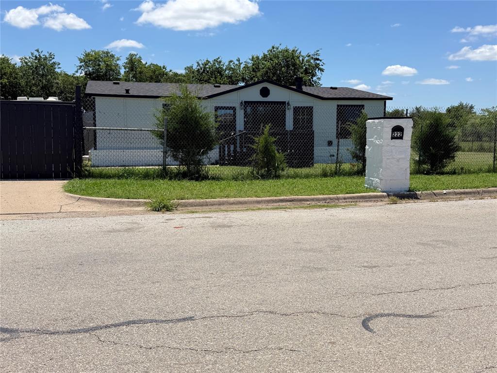 Welcome to this 3-Bedroom, 2 Bath manufacture home on a nice piece of land in Cleburne, Texas.  You will find private and peace of country living.
The open Floor plan connects the kitchen, dining, and living area. The updated kitchen and flooring, Granite countertops, Roof is 2 Years old and the Perimeter Fencing is already in place along with a Metal Gate for privacy for your pets or livestock.   Seller will contribute money towards closing costs.
