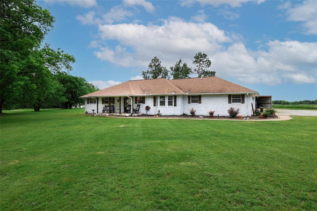 Situated on 5 acres, this meticulously maintained 3-bedroom, 2-bath home with a 2-car garage and dedicated office offers a functional open-concept layout.

The eat-in kitchen features a large island with quartz countertops, propane range, stainless steel appliances, and seamless flow into the main living area. The private primary suite includes dual sinks, a walk-in shower, and a built-in closet. Each additional bedroom offers a walk-in closet.

Outdoors, enjoy a fenced backyard, an additional carport and a stocked one-acre pond with bass, catfish, crappie, bluegill, and perch. Located in Caddo Basin Water District