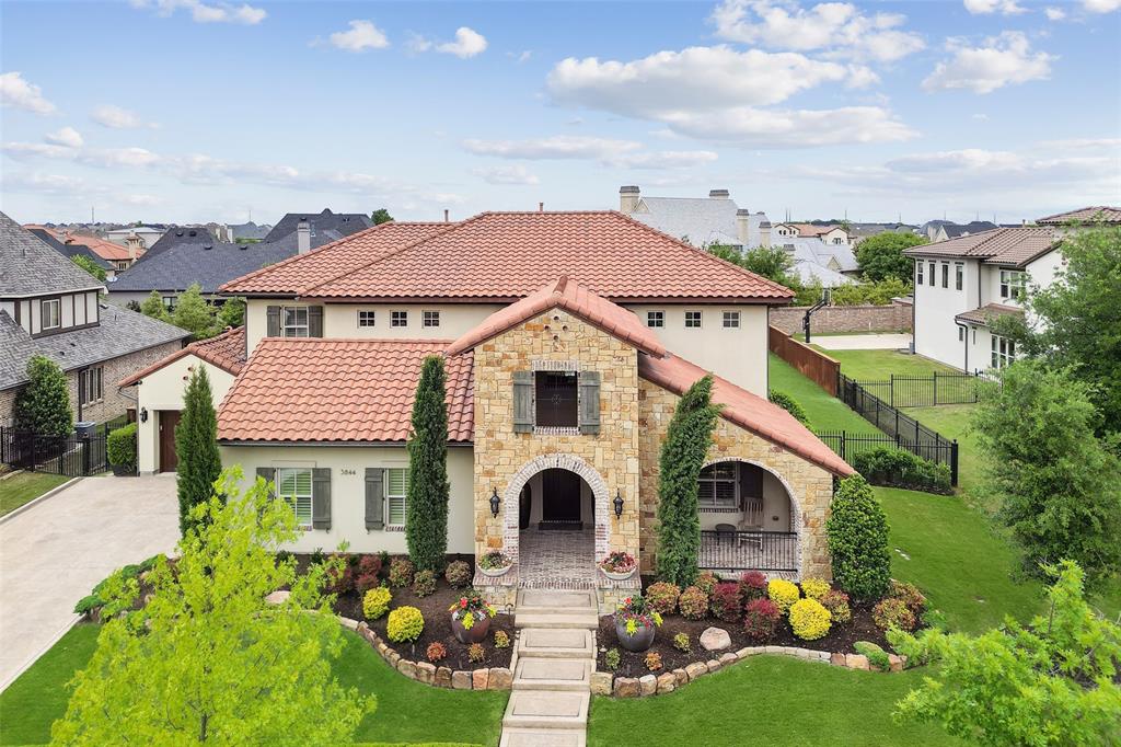 Extreme luxury with attention to detail in this stunning Darling Home in the prestigious Newman Village gated community. Watch gorgeous TX sunsets on the front porch. Inside experience the vaulted entry leading to the heart of the home showcasing wine room, multiple dining areas, gourmet kitchen quartz countertop, large island, stainless appliances, and refrigerator. Large living area with wall of window views to resort-style backyard. Media, half bath, oversized mudroom with pet kennel, built in storage, and desk. Main level boasts 2 bedrooms down; primary with sitting, spa bath and private covered patio. Guest bed with full bath, built in desk-murphy bed combo. Upstairs game room overlooks main living plus 3BD, 3BA. The backyard is an entertainer's dream. Oversized pool spa with fire feature, spacious patio with fireplace, outdoor kitchen; firepit, bocce court, turfed yard. Main home 4913 sqft + additional 461 sqft pool guest house with full bath and closet. Much more to experience.